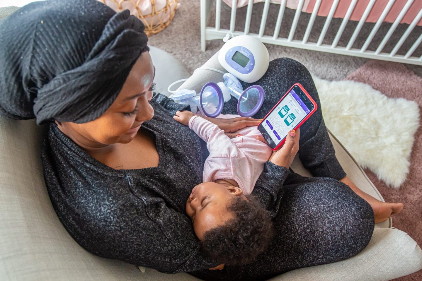mom using breast pump