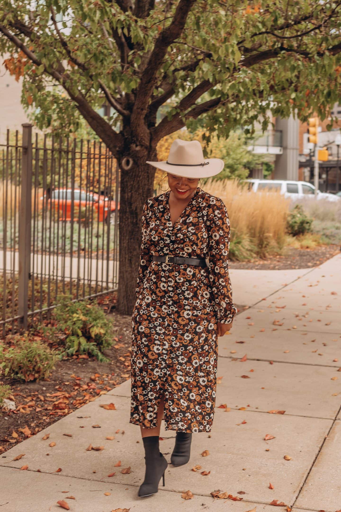 Fall dress outfit featured by top Indianapolis life and style blogger, Tales and Turbans: image of a woman wearing a Stitch Fix floral maxi dress and Zara boots.